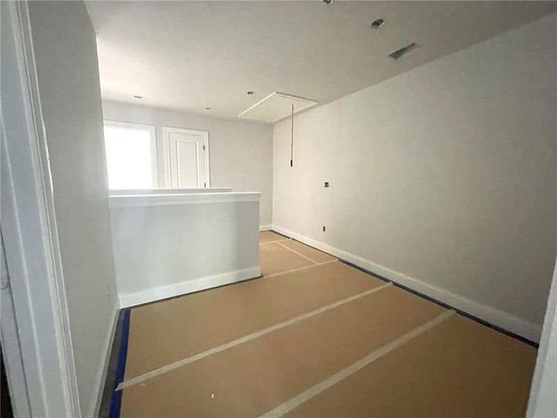 Spacious, unfurnished interior of a new home in The Village at Towne Lake, Woodstock (Image 49).