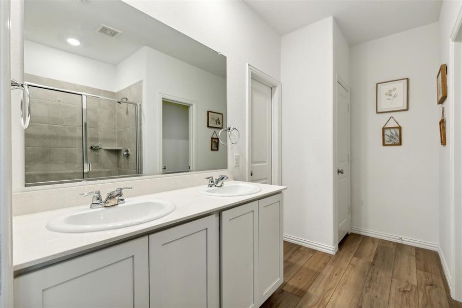 Large vanity with dual sinks means no fighting for space when getting ready in the morning!