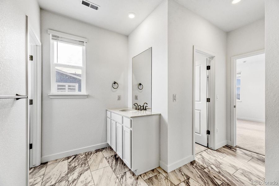 Furnished interior view inside a new home in Vermilion Creek, Centennial (Image 4).