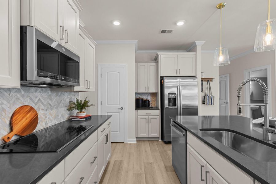 Representative furnished interior of a home built from the The Hibiscus by Chesapeake Homes in Coastal Club of the Carolinas, Calabash (Image 24).