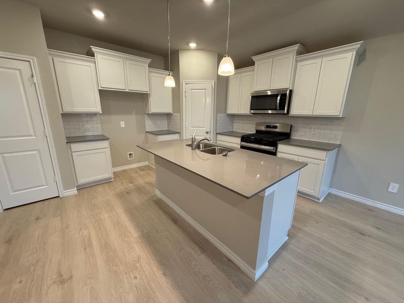 Furnished interior view inside a new home in Southern Pointe, College Station (Image 2).