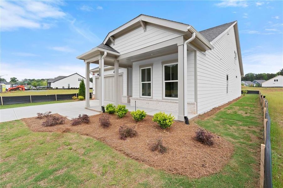 Exterior details and patio area of a home in The Reserve at Bells Ferry, Kennesaw (Image 4).