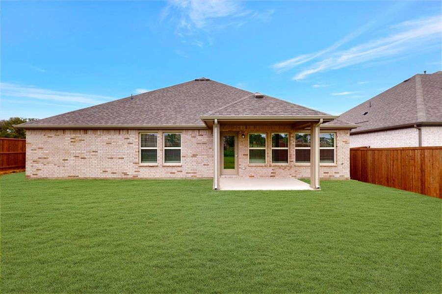 Front exterior of a new home in Kings Way, Denton, TX, highlighting curb appeal (Image 18).