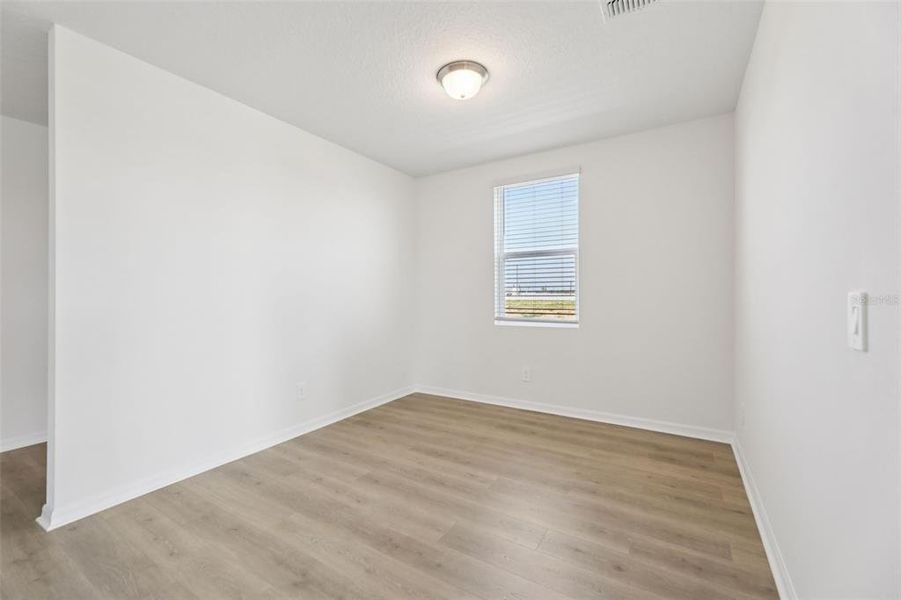 Spacious, unfurnished interior of a new home in Crosswinds - Signature Series, Haines City (Image 30).