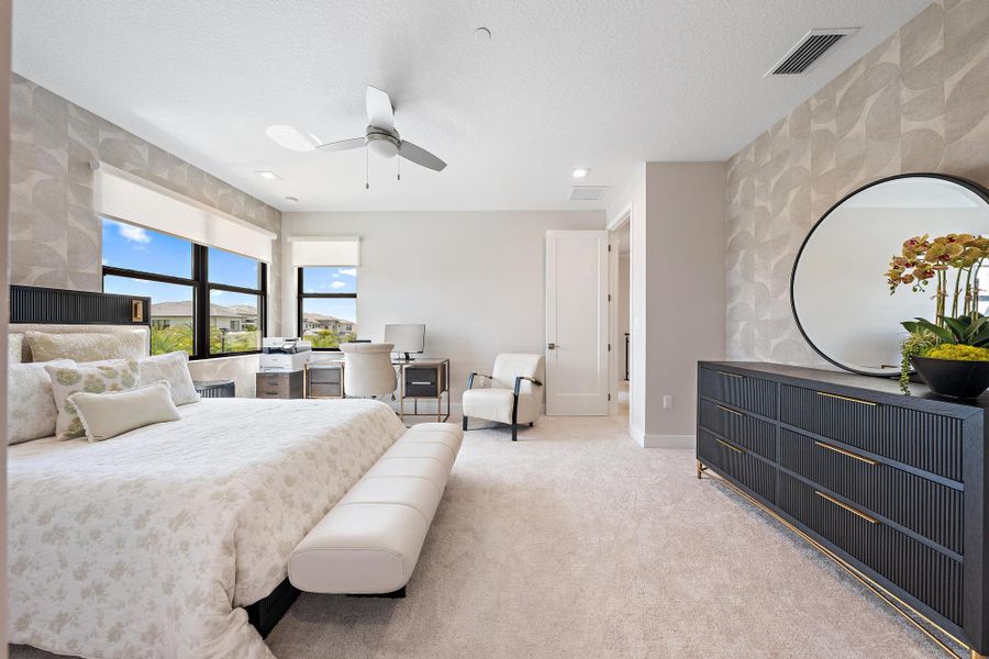 Designer wallpaper and blinds over the hurricane impact windows.