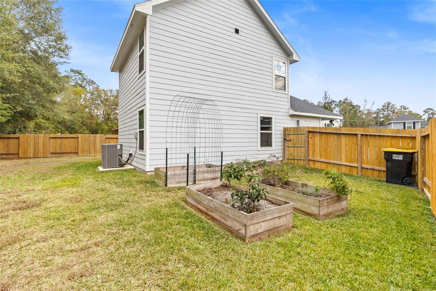 Exterior details and patio area of a home in Marie Village, Conroe (Image 7).