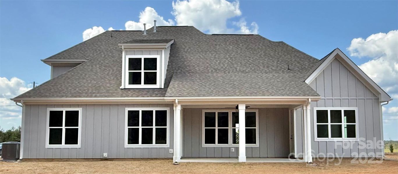 Front exterior of a new home in , Waxhaw, NC, highlighting curb appeal (Image 26).