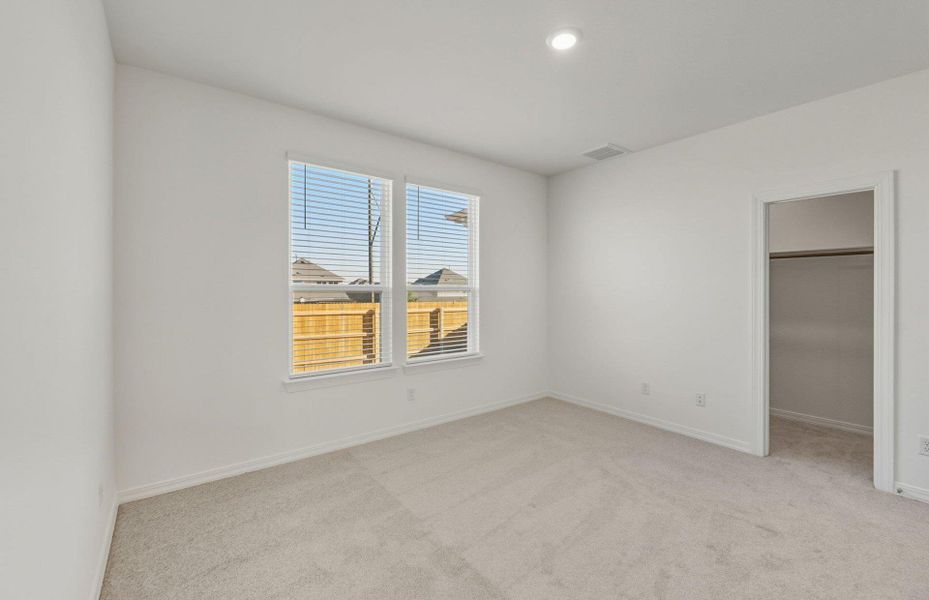 Spacious, unfurnished interior of a new home in Crosswinds, Kyle (Image 15).