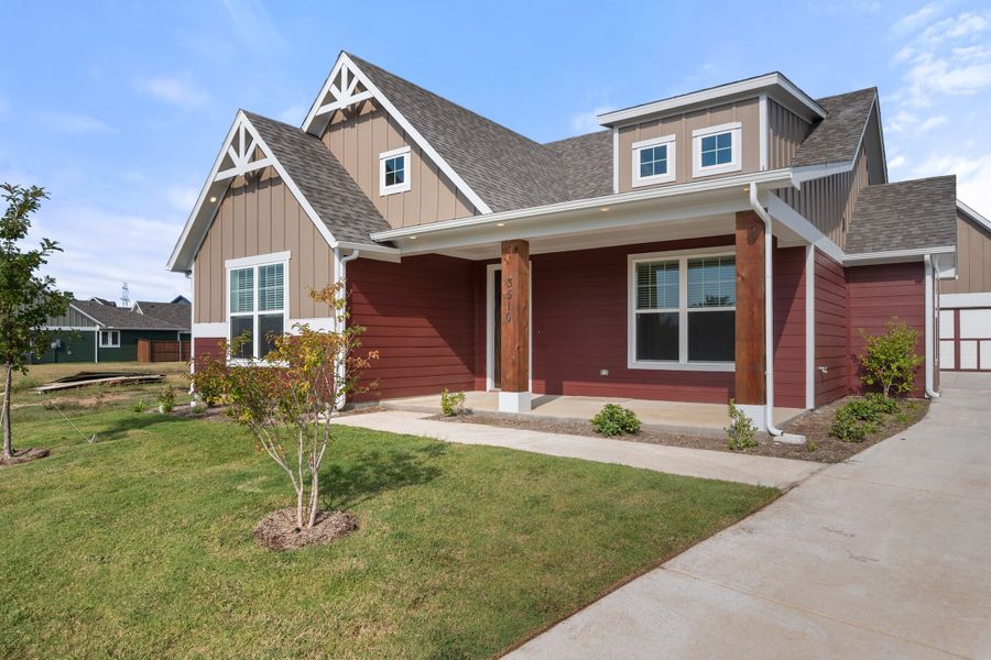 Front exterior of a new home in Heritage Towne, Midlothian, TX, highlighting curb appeal (Image 2). Front exterior of a new home in Heritage Towne, Midlothian, TX, highlighting curb appeal (Image 2).