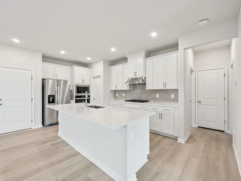 Furnished interior view inside a new home in Oak Manor - Classic Series, Garner (Image 3). Furnished interior view inside a new home in Oak Manor - Classic Series, Garner (Image 3).