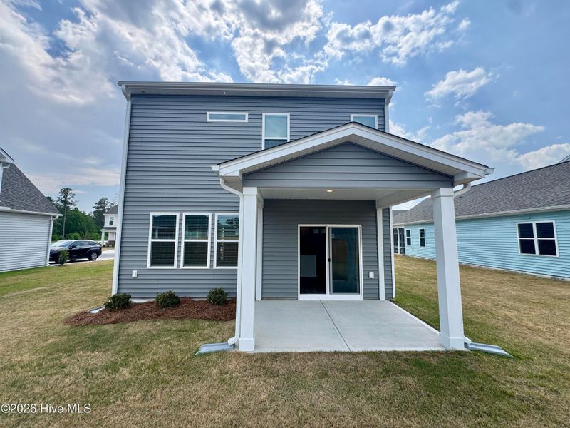 Exterior details and patio area of a home in Coastal Haven, Leland (Image 3).
