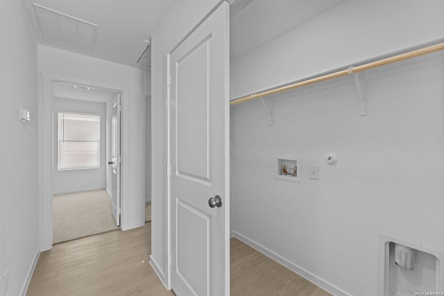 Spacious, unfurnished interior of a new home in Higdon Crossing, San Antonio (Image 12).