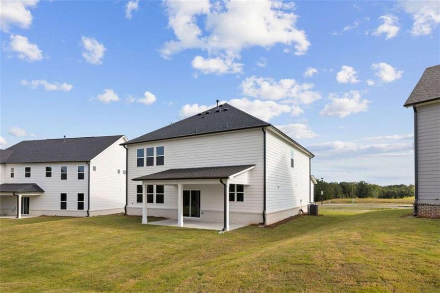 Exterior details and patio area of a home in The Estates at Gainesville Township, Gainesville (Image 9).