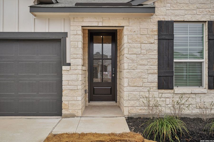 Exterior details and patio area of a home in Estancia Ranch - Premier Series, San Antonio (Image 27).