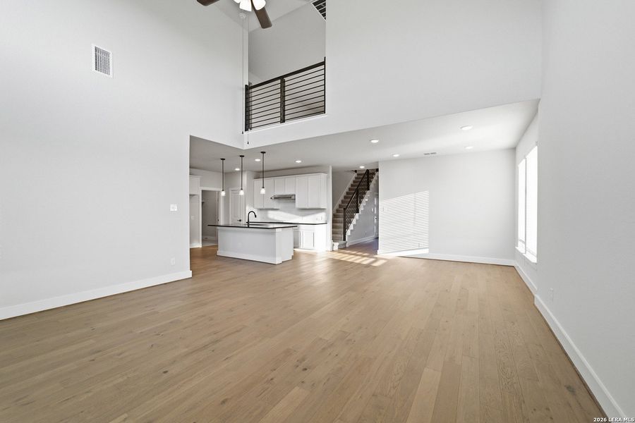 Spacious, unfurnished interior of a new home in The Woodlands at Medina Hills, Mico (Image 30).