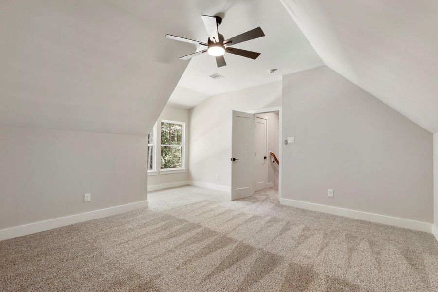 Huge bedroom upstairs with walk-in closets and full bathroom. Also great for a game room, home gym, or 2nd office.