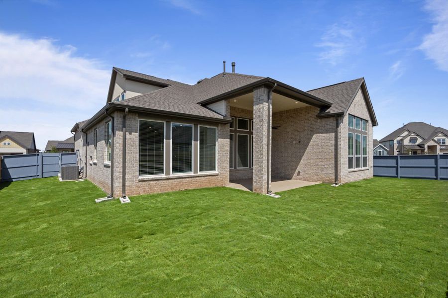 Exterior details and patio area of a home in Fulshear Lakes, Fulshear (Image 32). Exterior details and patio area of a home in Fulshear Lakes, Fulshear (Image 32).