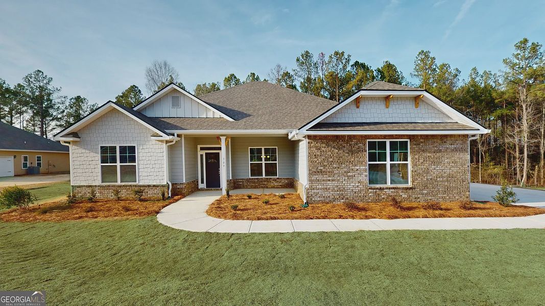 Front exterior of a new home in Holliday Pass, Griffin, GA, highlighting curb appeal (Image 1). Front exterior of a new home in Holliday Pass, Griffin, GA, highlighting curb appeal (Image 1).