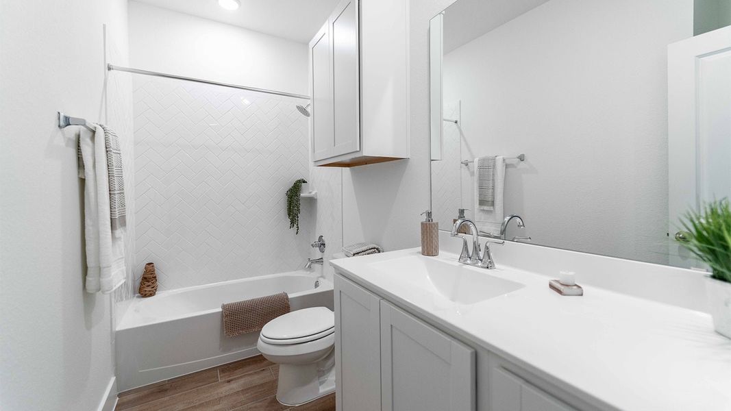 Furnished interior view inside a new home in Massey Oaks, Pearland (Image 9). Furnished interior view inside a new home in Massey Oaks, Pearland (Image 9).