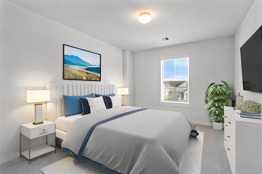 Secondary bedroom features plush carpet, custom paint and a large window with privacy blinds.