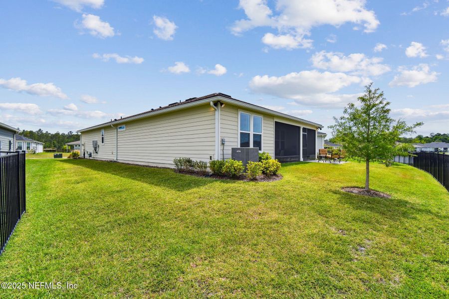 Front exterior of a new home in , St. Augustine, FL, highlighting curb appeal (Image 1).