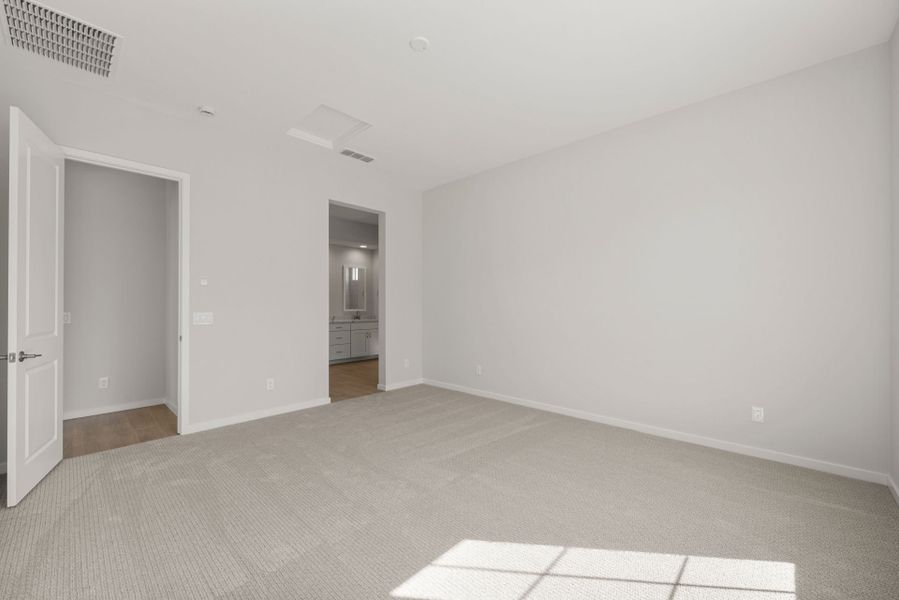 Spacious, unfurnished interior of a new home in Harvest - Enchantment Series, Queen Creek (Image 28). Spacious, unfurnished interior of a new home in Harvest - Enchantment Series, Queen Creek (Image 28).