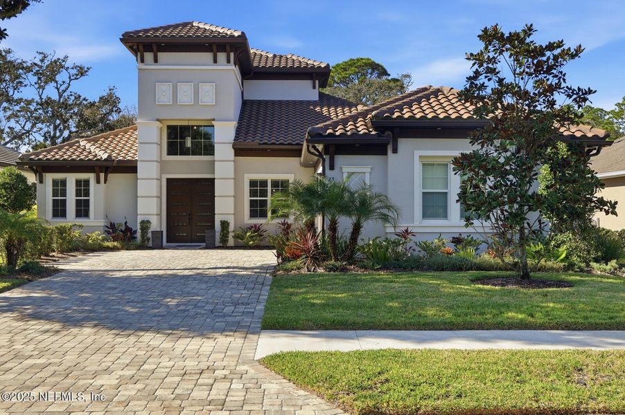 Front exterior of a new home in , Palm Coast, FL, highlighting curb appeal (Image 28).