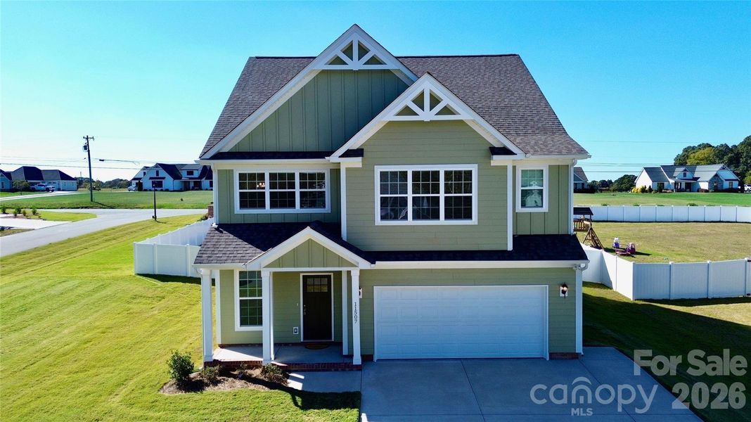 Front exterior of a new home in , Stanfield, NC, highlighting curb appeal (Image 29).