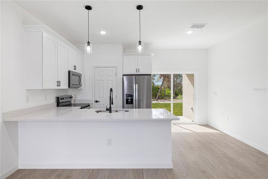 Furnished interior view inside a new home in , Poinciana (Image 5).