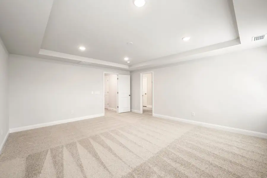 Spacious, unfurnished interior of a new home in Waterways, Richmond Hill (Image 58).