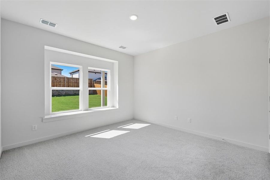 Unfurnished room featuring carpet and recessed lighting Unfurnished room featuring carpet and recessed lighting