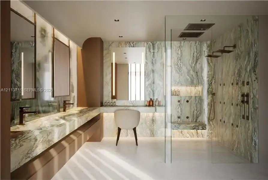 Floating vanity with stone countertop, integrated lighting, wall-mounted faucets, and walk-in glass-enclosed shower with stone surround