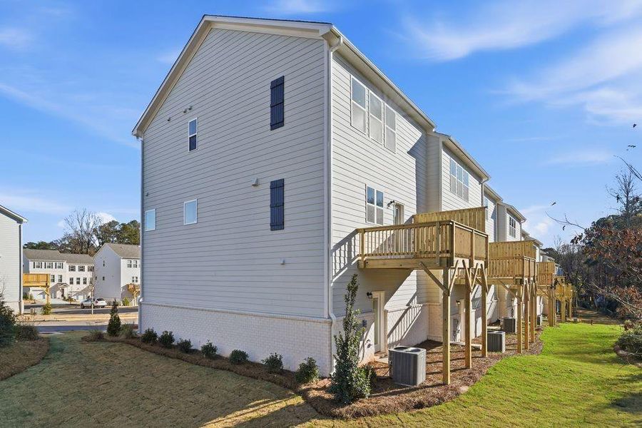 Exterior details and patio area of a home in Somerset at Veterans Memorial, Mableton (Image 23).
