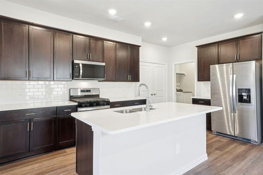 Photo is not of the actual home, but is an inspirational photo of builder’s model home and may depict options, furnishings, and/or decorator features that are not included.