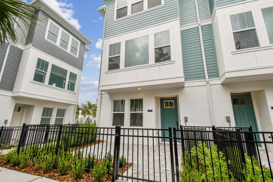 Exterior details and patio area of a home in Towns at Union, St. Petersburg (Image 2). Exterior details and patio area of a home in Towns at Union, St. Petersburg (Image 2).