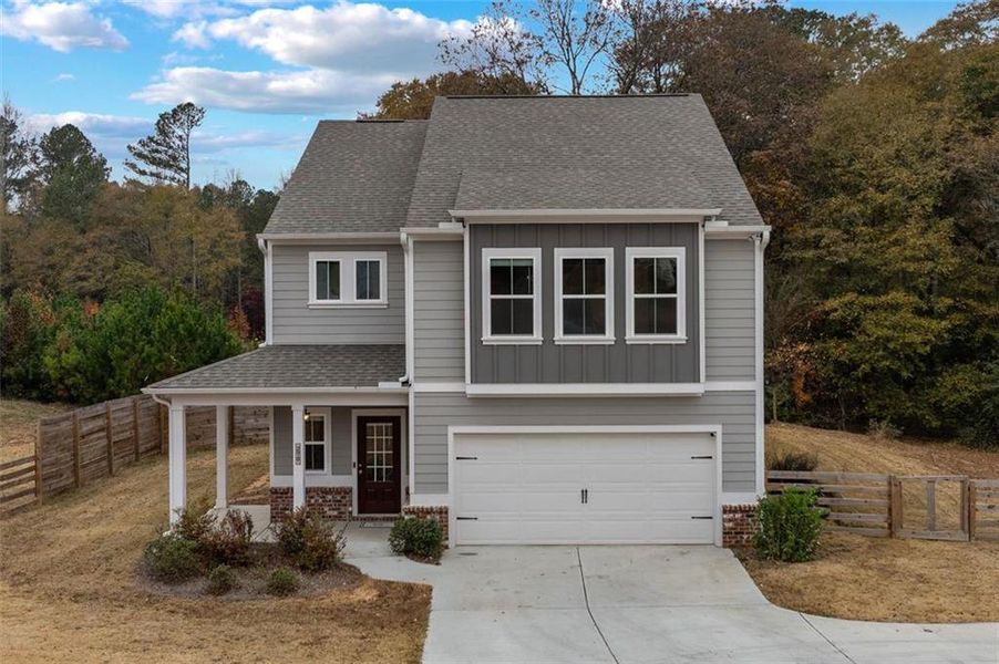 Front exterior of a new home in , Auburn, GA, highlighting curb appeal (Image 26).