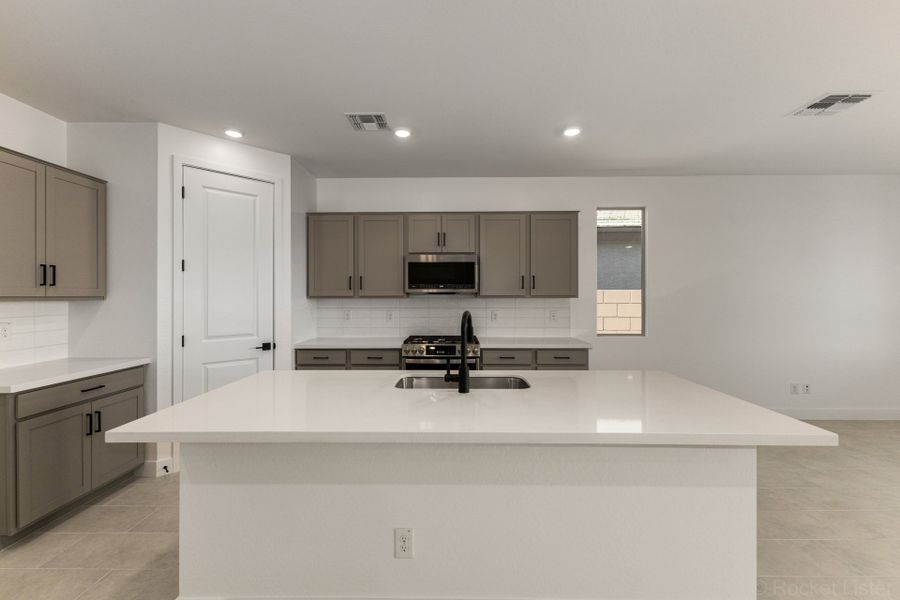 Furnished interior view inside a new home in Bella Vista Farms, San Tan Valley (Image 3).