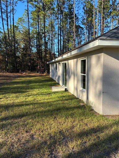 Exterior details and patio area of a home in , Ocala (Image 16).