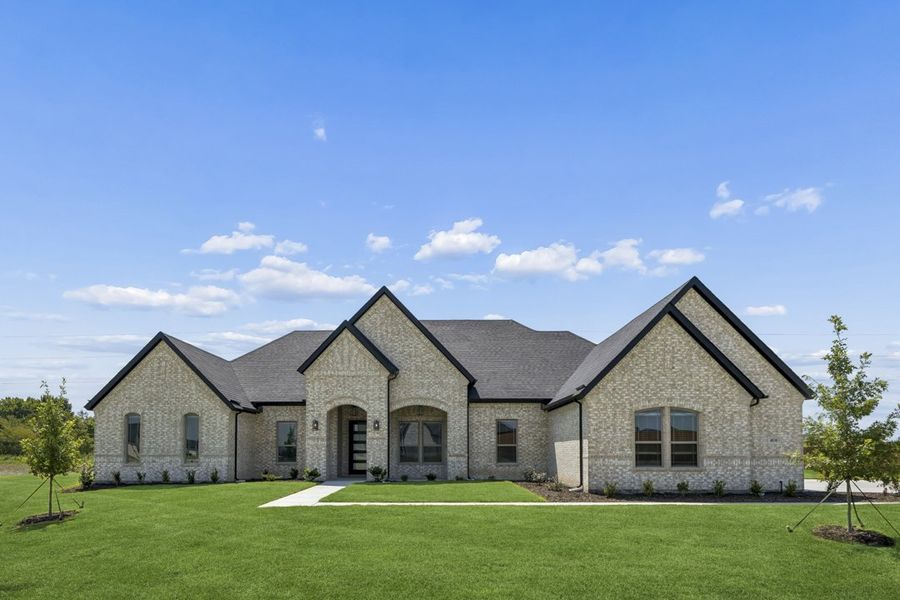Representative exterior photo of a completed home built from the The Cedarcrest by Lillian Custom Homes in The Arbors Midlothian, Midlothian, TX (Image 26).