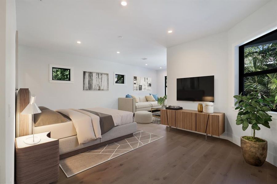 Primary bedroom with sitting area.  Virtually staged