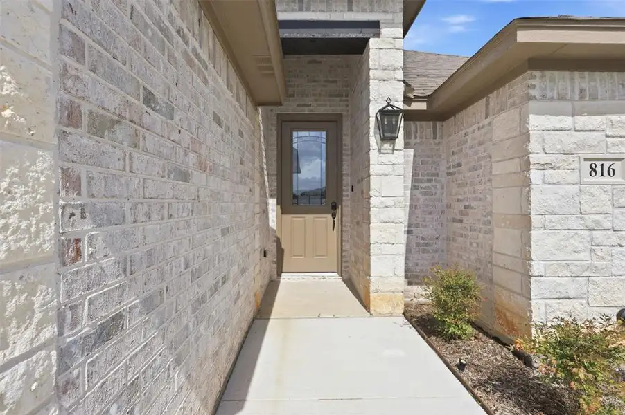 Exterior details and patio area of a home in , Springtown (Image 3).