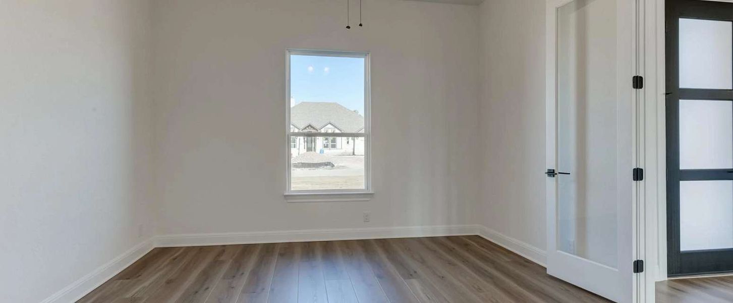 Representative unfurnished interior of a home built from the Kylie by Ashton Woods in Waldsanger, New Braunfels (Image 13).
