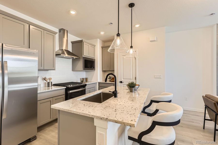 Furnished interior view inside a new home in Argenta, Aurora (Image 8).