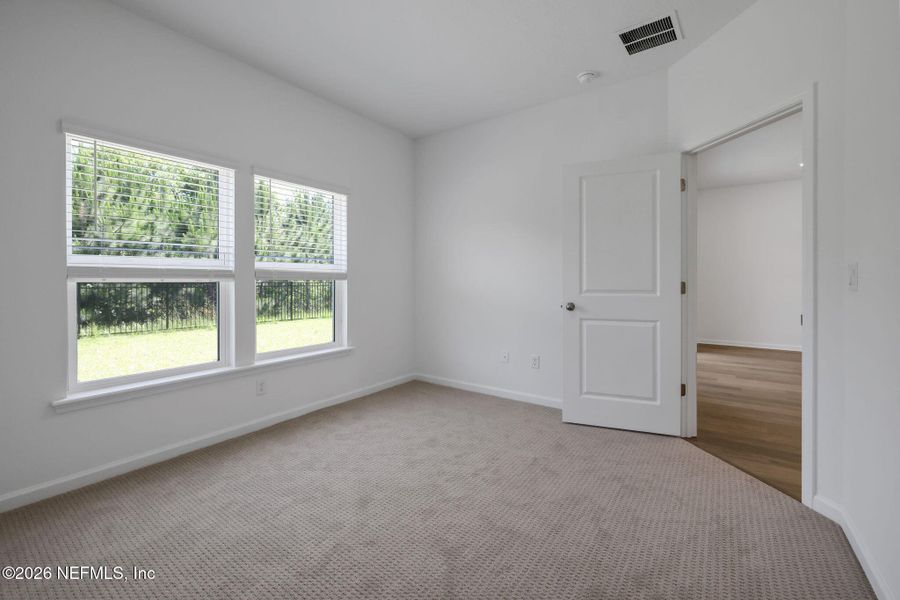 Spacious, unfurnished interior of a new home in Hyland Trail, Green Cove Springs (Image 50).
