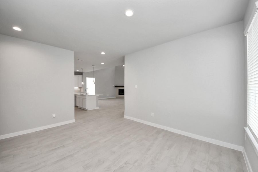 Another perspective of the dining area. Sample photo of completed home with similar floor plan. Actual colors and selections may vary. Another perspective of the dining area. Sample photo of completed home with similar floor plan. Actual colors and selections may vary.