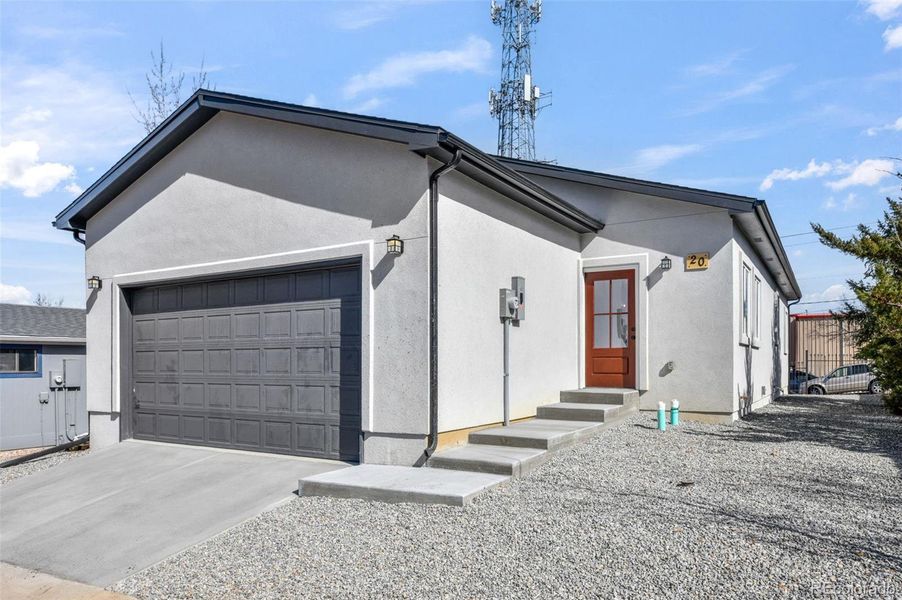 Front exterior of a new home in , Colorado Springs, CO, highlighting curb appeal (Image 31).