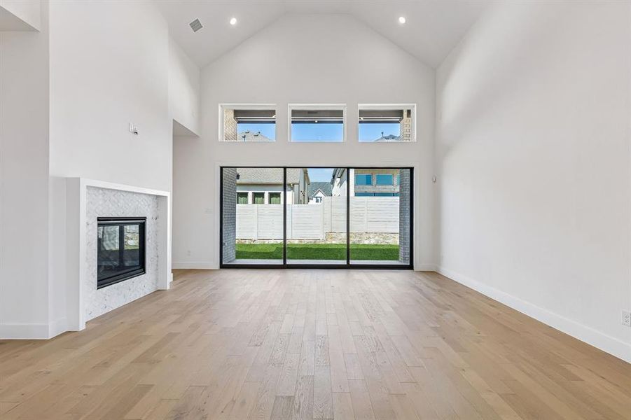 You'll enjoy lovely backyard views from the full wall slider in your spacious family room.