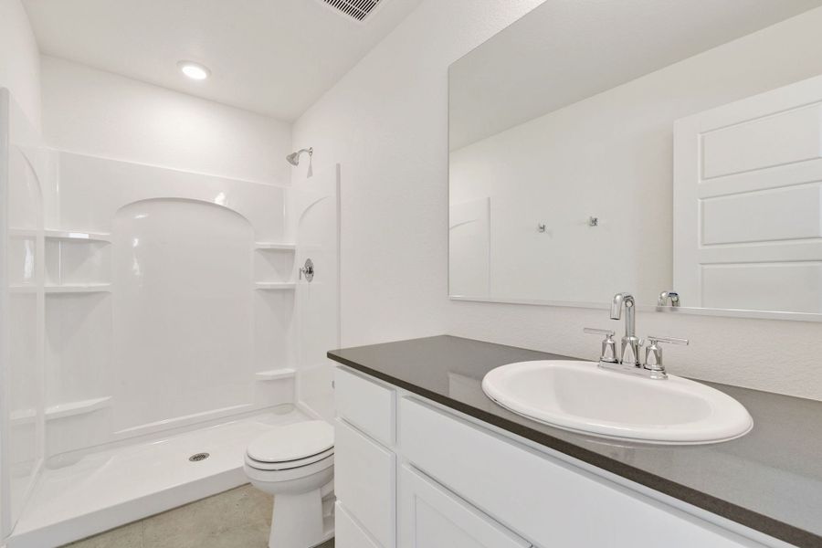 Representative furnished interior of a home built from the Pinecliffe by Baessler Homes in Liberty Draw, Evans (Image 11).