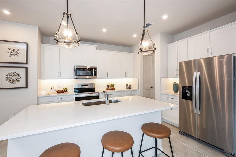Furnished interior view inside a new home in Sanderling, Palmetto (Image 5).