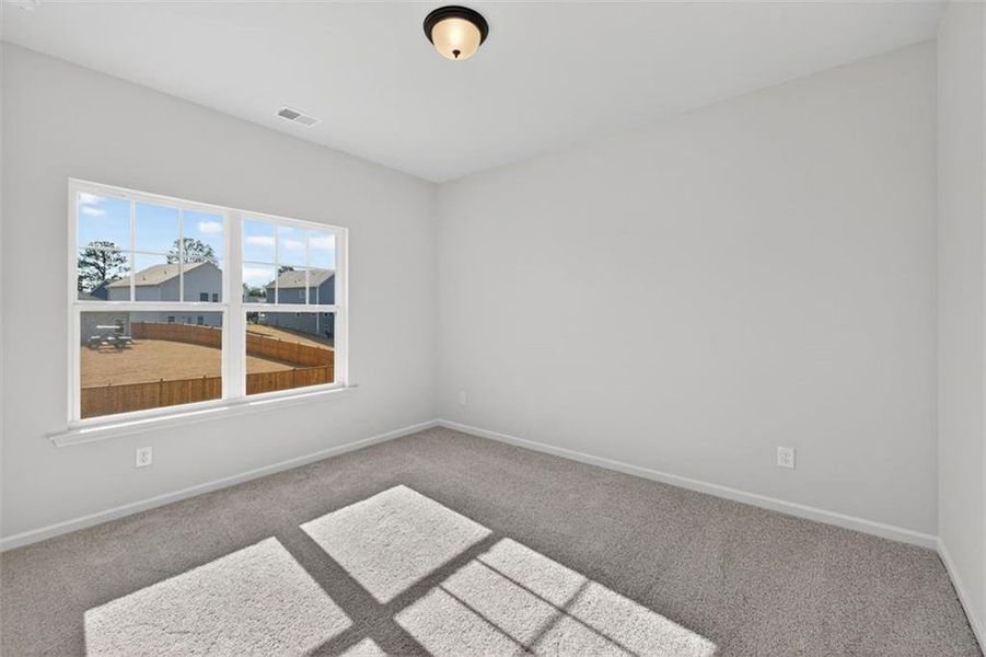 Spacious, unfurnished interior of a new home in Garrett Preserve, Douglasville (Image 28).